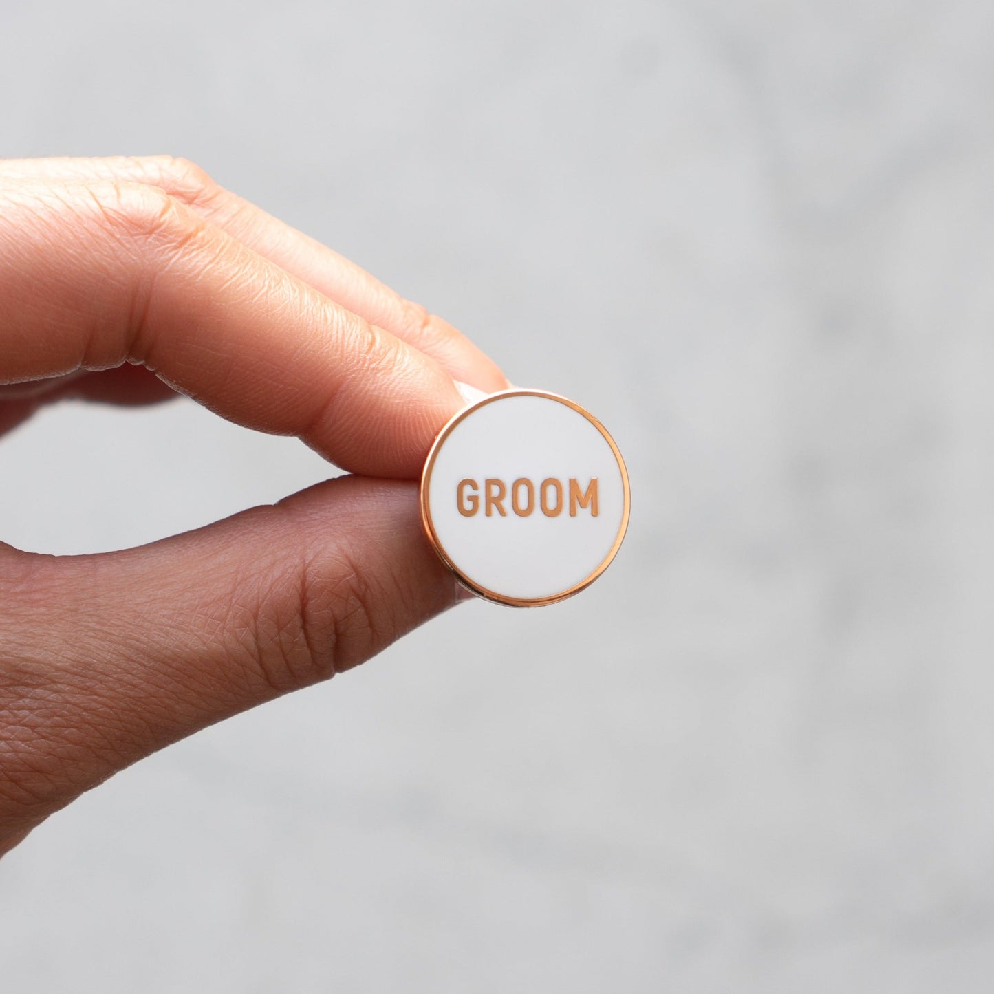 
                  
                    Round Groom Pin | Palm and Posy
                  
                